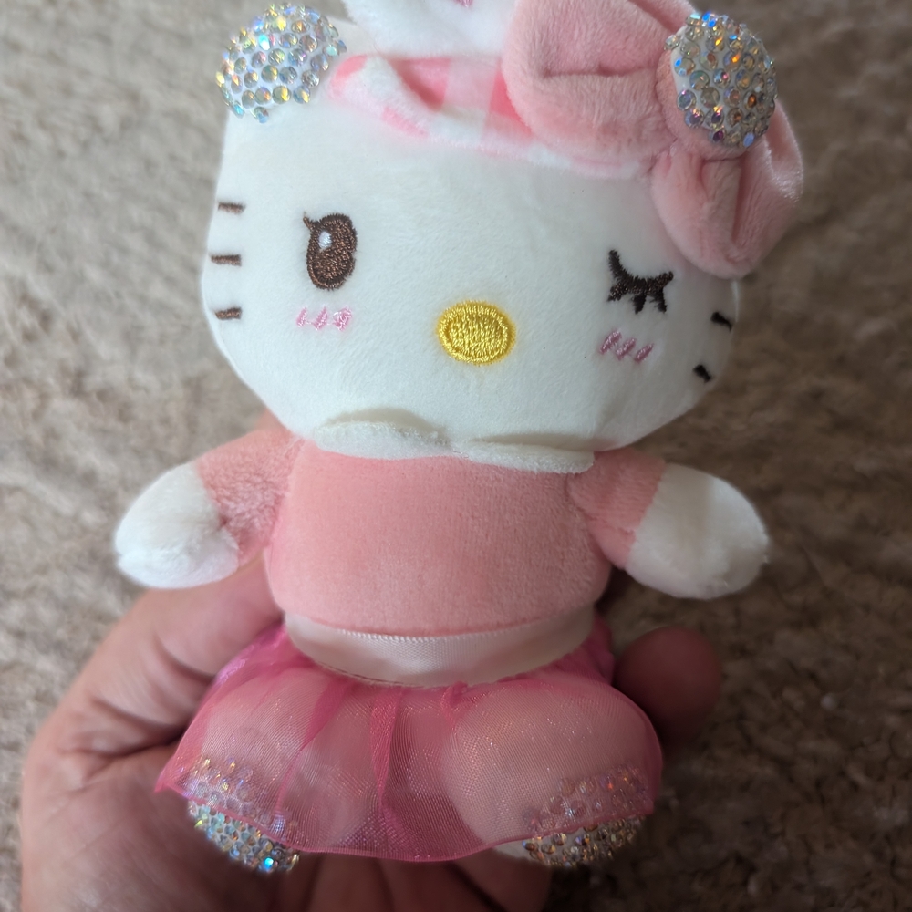 Pink and White Plush Toy with Bow